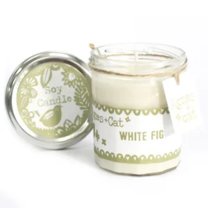 Doftljus i glasburk med etikett Agnes & Cat och texten White Fig
