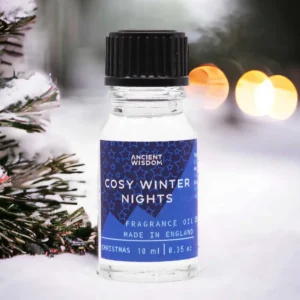 Flaska med Ancient Wisdom doftolja Cosy Winter Nights 10 ml med blå etikett och svart skruvkork