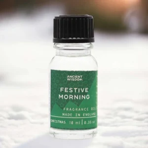 Flaska med Ancient Wisdom doftolja Festlig morgon 10 ml med grön etikett