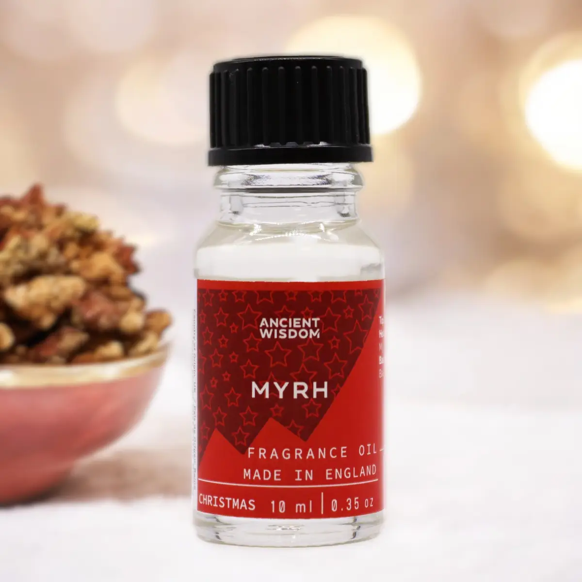 Flaska med Ancient Wisdom doftolja myrra 10 ml med röd etikett och svart lock