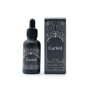 Flaska och förpackning för Ancient Witch parfymolja Cursed med svart etikett och vit dekor
