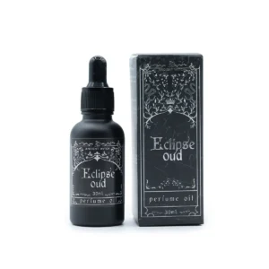 Svart flaska och förpackning med Ancient Witch parfymolja Eclipse Oud