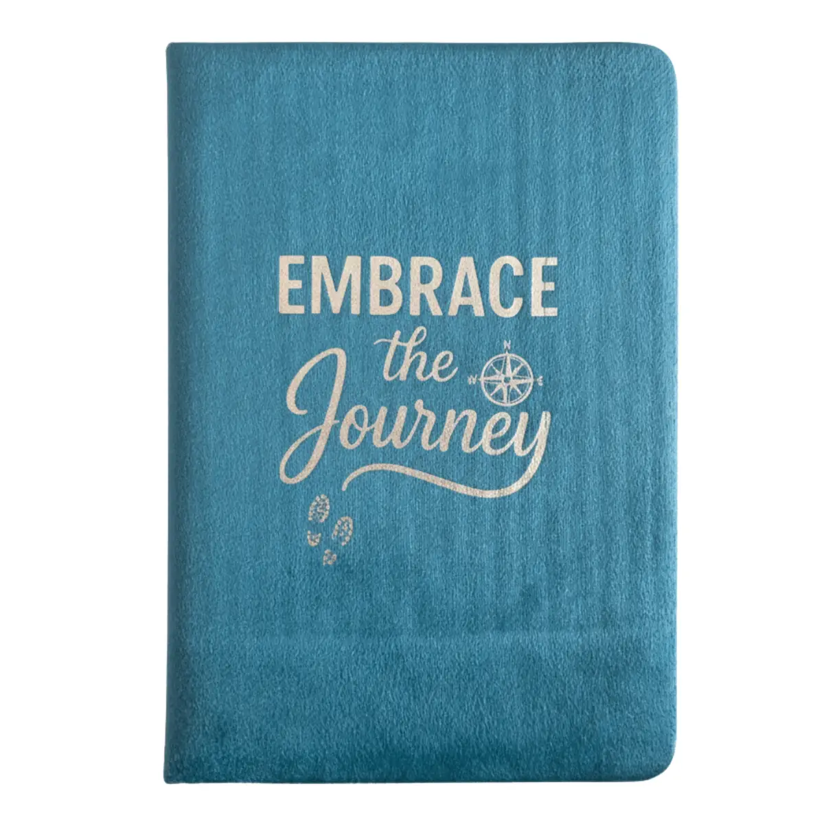 Ljusblå anteckningsbok i sammet med texten Embrace the Journey i silvertryck på omslaget