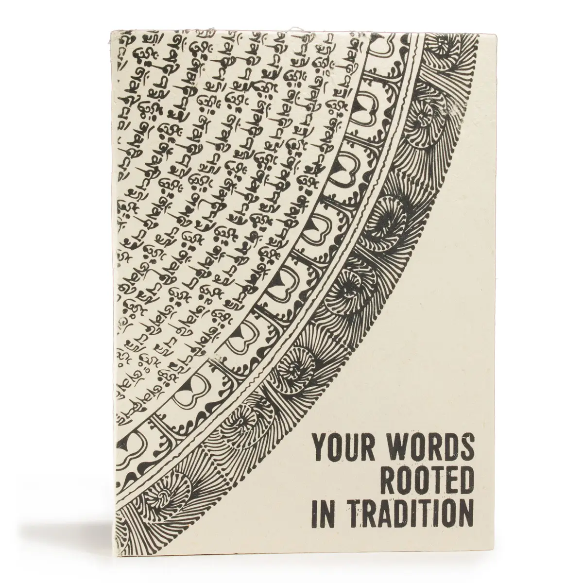 Anteckningsbok med svartvit traditionell design och text på omslaget