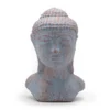 Antik Buddha-huvud i blå kopparbetong