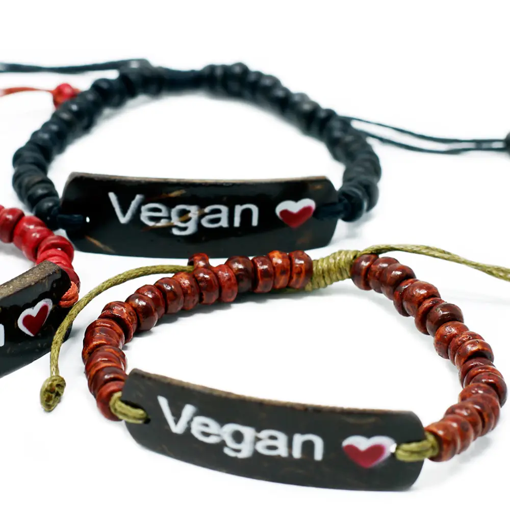 Armband med budskap i kokosnöt och stretchmaterial - produktbild 5