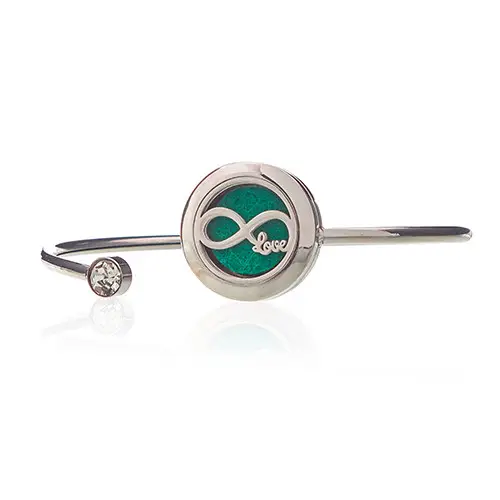 Aromaterapiarmband med silverfärgad evighetssymbol och grön filtplatta