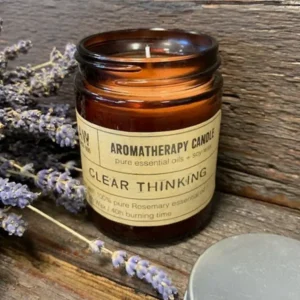 Brun glasburk med aromaterapiljus och etikett med texten Clear Thinking