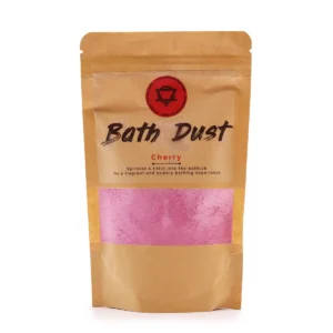 Förpackning med rosa badpulver i brun påse märkt Bath Dust Cherry