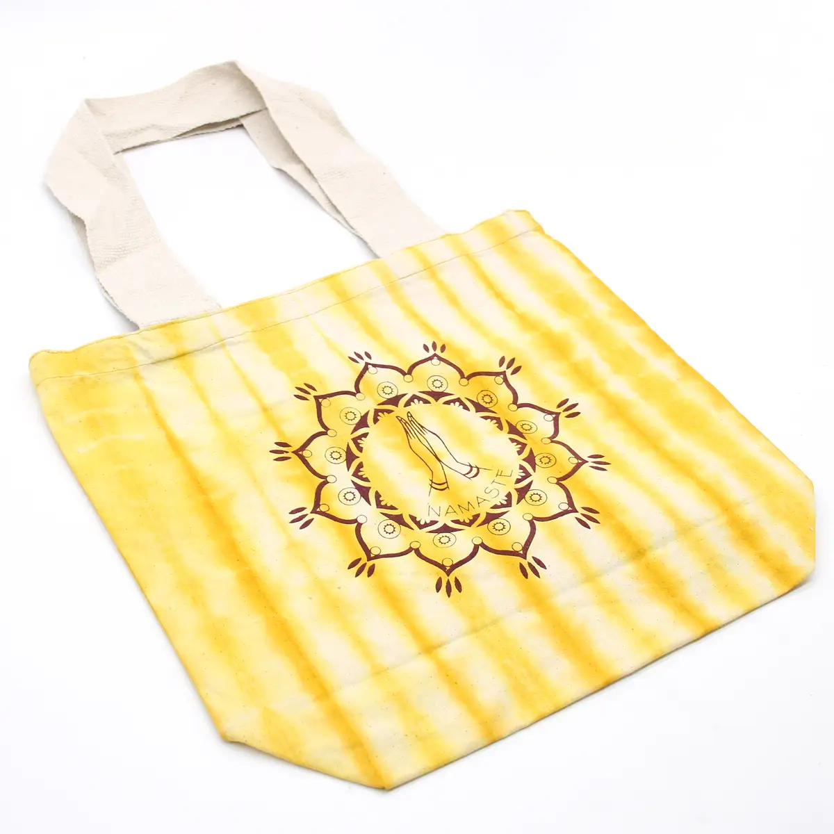 Batikkamönstrad bomullsväska med Namaste Hands-motiv, gul med naturfärgat handtag - produktbild 2