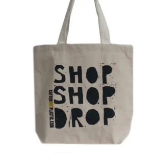 Bomullspåse med trycket Shop Shop Drop i svart på naturfärgad bakgrund