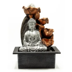 Bordsvatteninstallation med Buddhafigur och kristallkula i vattenfall