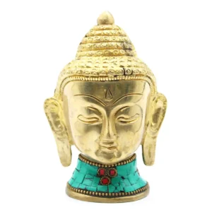 Litet buddhahuvud i mässing med turkos och karneoldetaljer