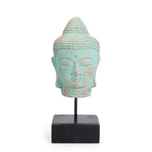 Grönt Buddhahuvud med kopparfinish på svart stativ mot vit bakgrund