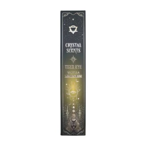 Förpackning med Crystal Scents rökelsepinnar i svart och guld med stjärnmotiv
