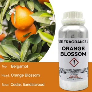 Flaska med doftolja Apelsinblom 500 ml och apelsinblommor på gren