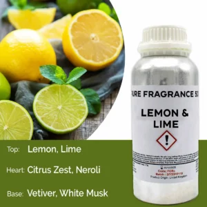 Flaska med doftolja citron och lime bredvid citron- och limeskivor
