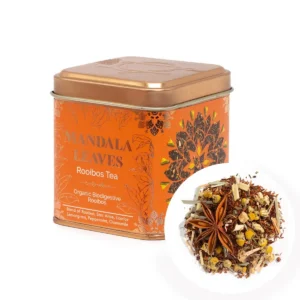 Kopparfärgad burk med ekologiskt rooibos-te och en närbild på teblandning med stjärnanis och örter