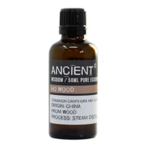 Flaska med Ho Wood eterisk olja 50 ml i brunt glas med svart lock