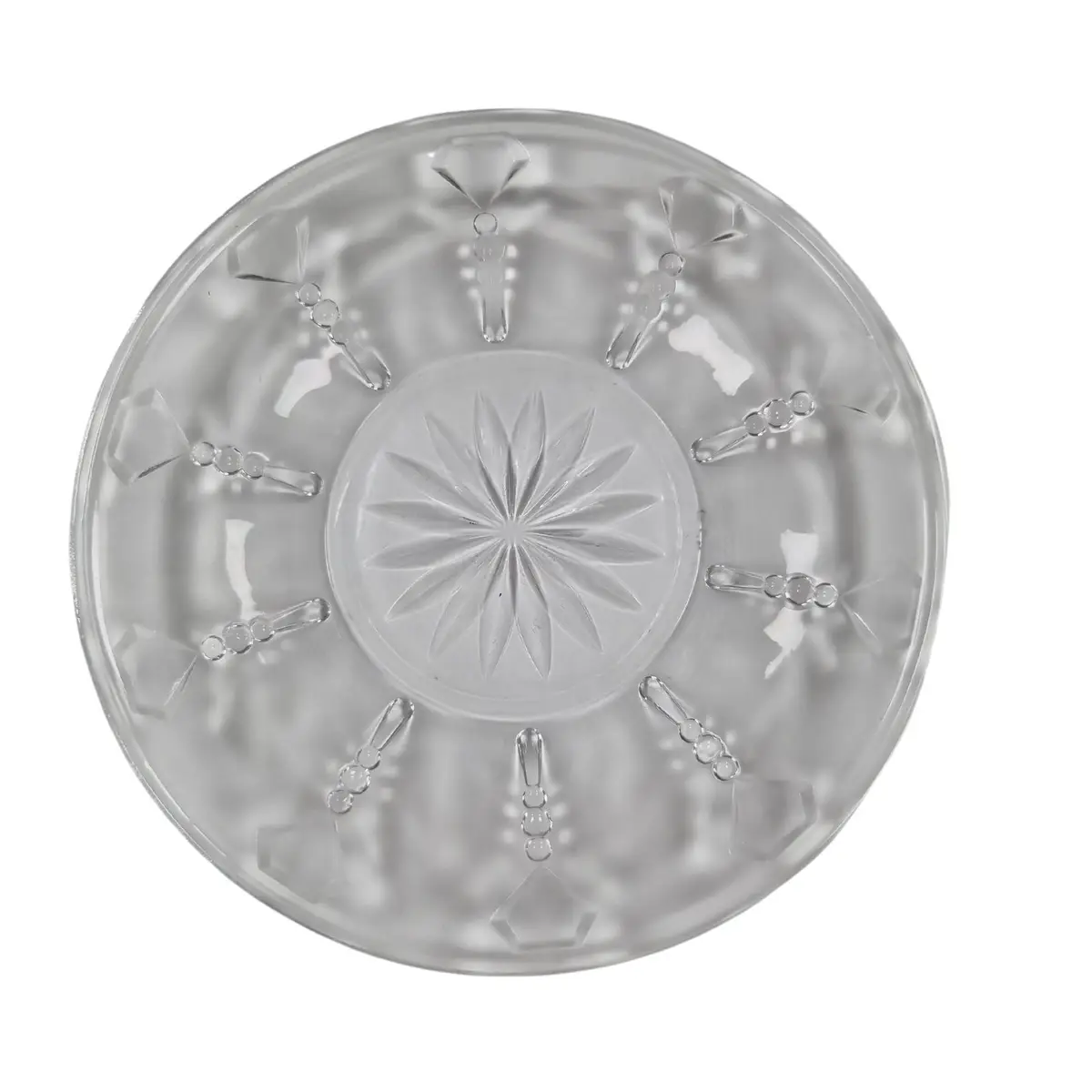Runt glasfat med dekorativt mönster, diameter 12 cm
