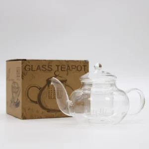 Rund glaskanna med infuser för te i klart glas med pärlemorsfärgad design