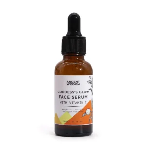 Brun glasflaska med pipett innehållande Goddess’s Glow ansiktsserum med vitamin C