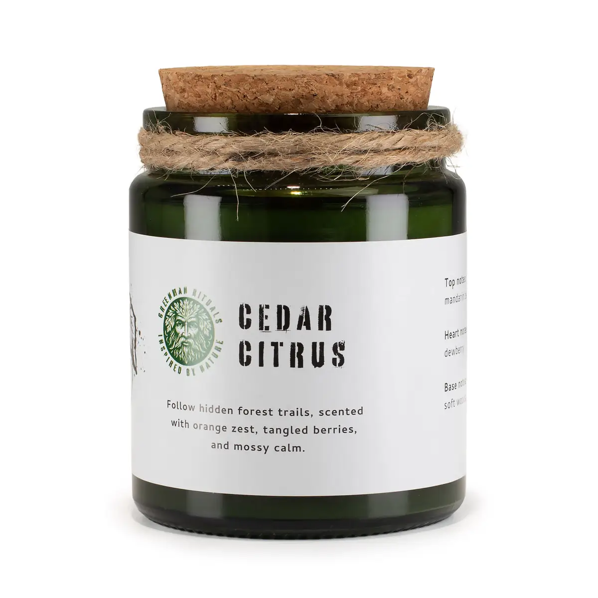 Grönt glasljus med korklock och etikett för Greenman Woodwick Forest Resin