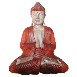 Handgjord Buddha-staty i Suarträ med röda och beige nyanser i sittande meditationsställning