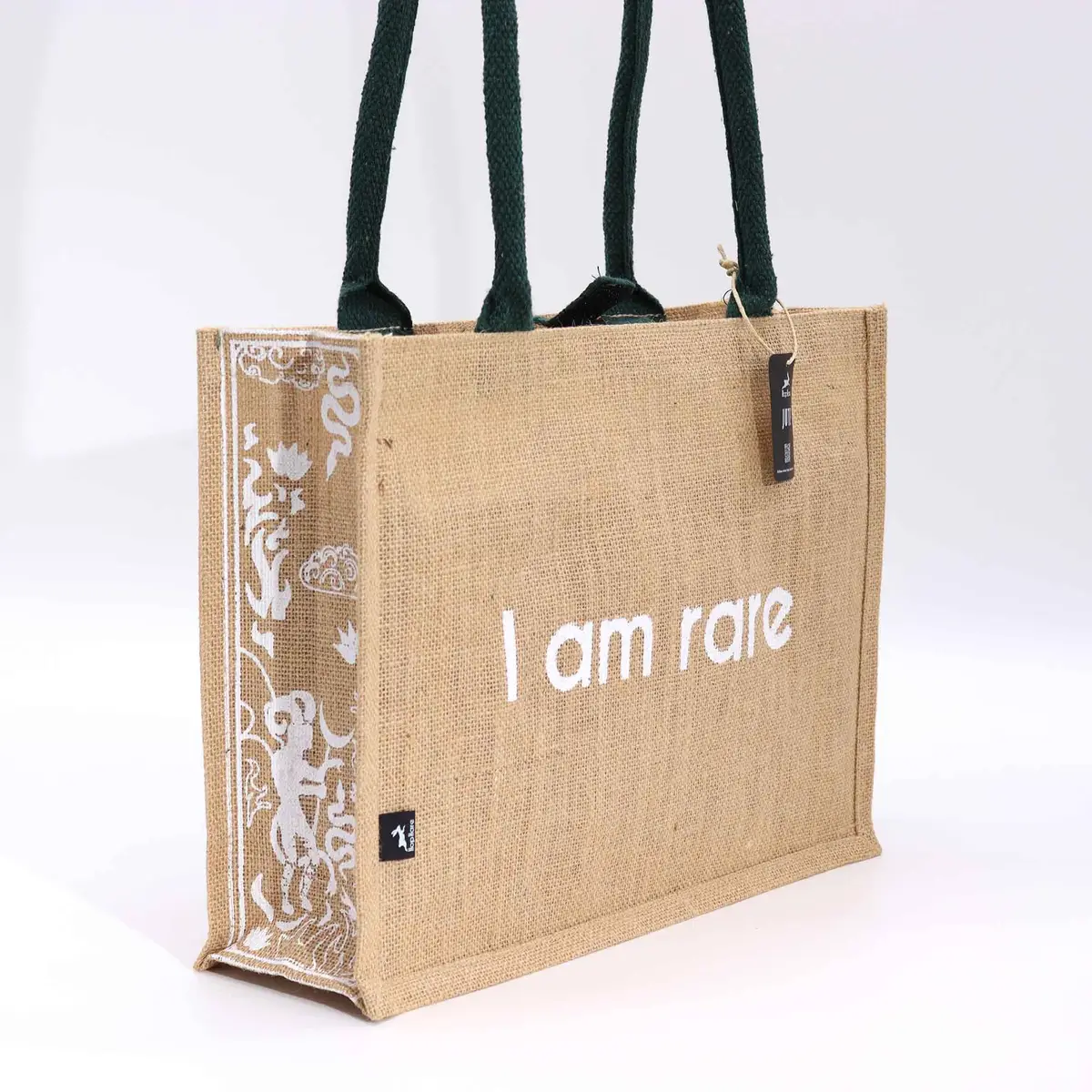 Stor jutesäck från Hop Hare med texten I am Rare och gröna handtag