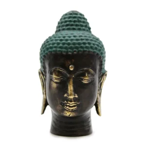 Litet Buddhahuvud i antik mässing med grön patina på toppen