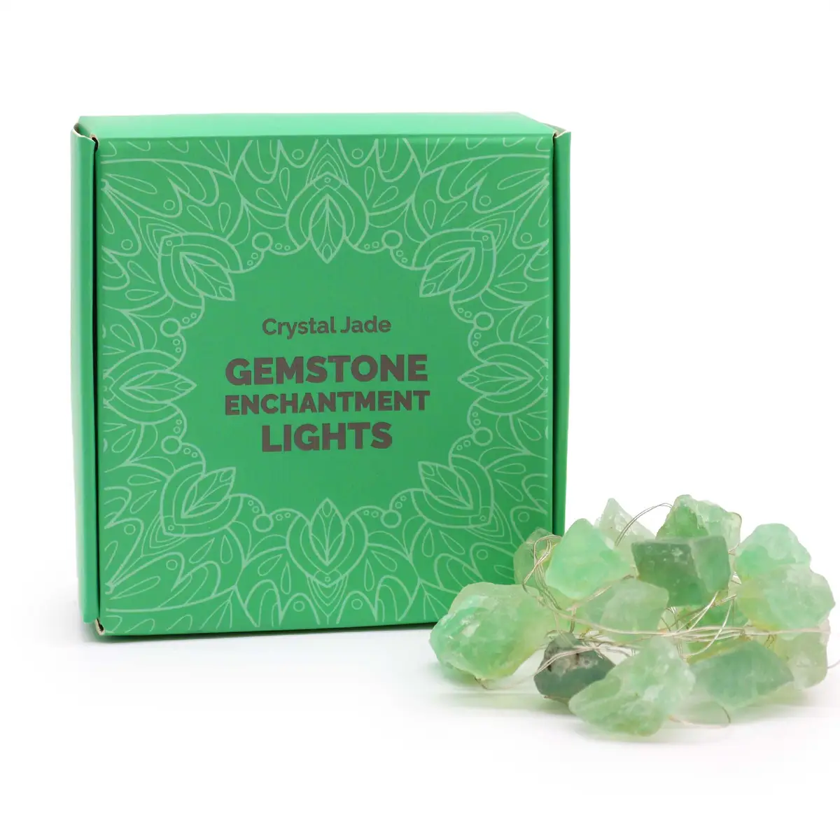 Grön förpackning med text Gemstone Enchantment Lights och ljusslinga med gröna kristalljade-ädelstenar