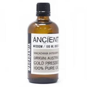 Flaska med kallpressad macadamiaolja 100 ml i brun glasflaska
