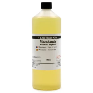Flaska med 1 liter macadamiaolja basolja med vit etikett och svart kork