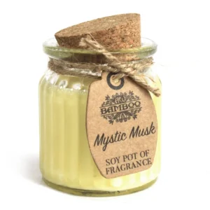 Doftljus i glasburk med korklock och etikett Mystic Musk