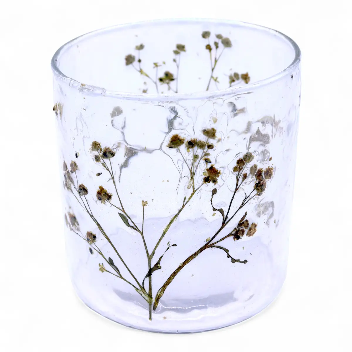 Cylindrisk glasljusstake med inbäddade torkade blommor