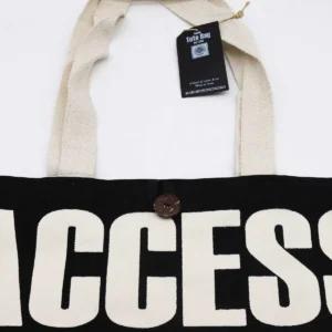 Nomad Sari ikonisk klassisk tygkasse Access All Areas svart och naturvit 10oz - produktbild 4