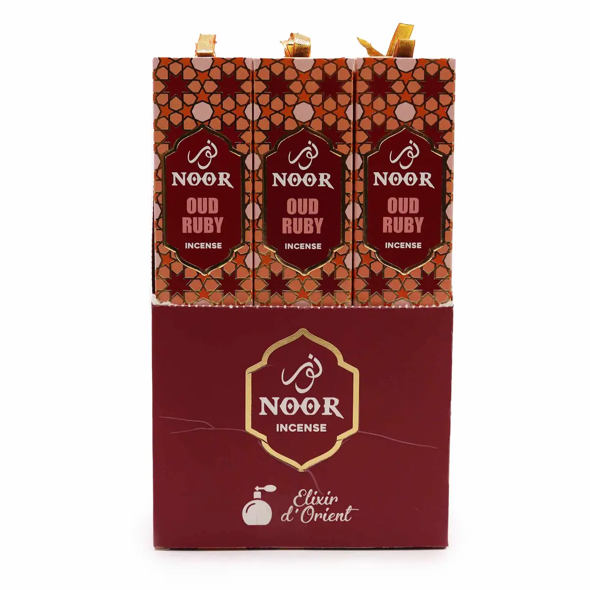 Förpackning med Noor Oud Ruby premium rökelsepinnar i rött och guldmönster