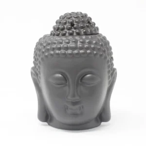 Svart oljebrännare i keramik formad som ett Buddha-huvud