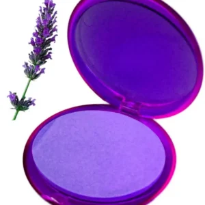 Öppen dosa med lila pocketpapperstvål och lavendelblomma bredvid