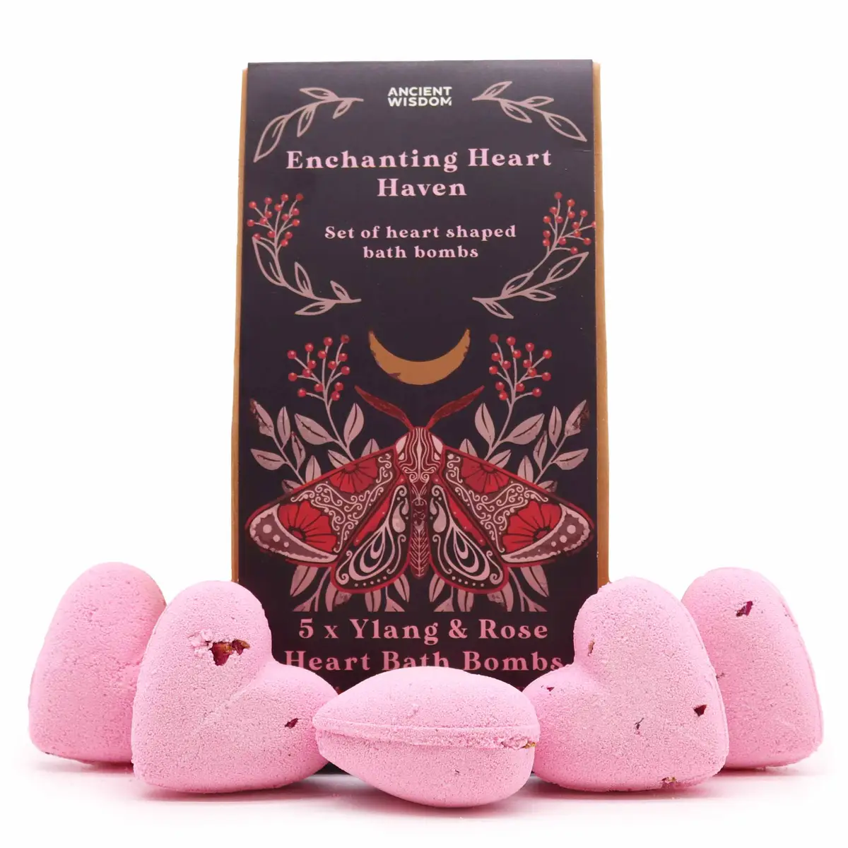 Presentförpackning med fem rosa hjärtformade badbomber framför