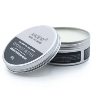 Öppen burk med Pure Body Butter kokosnötssmör i aluminiumförpackning