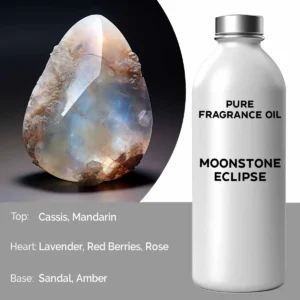 Polerad månstenssten bredvid vit flaska med texten Pure Fragrance Oil Moonstone Eclipse