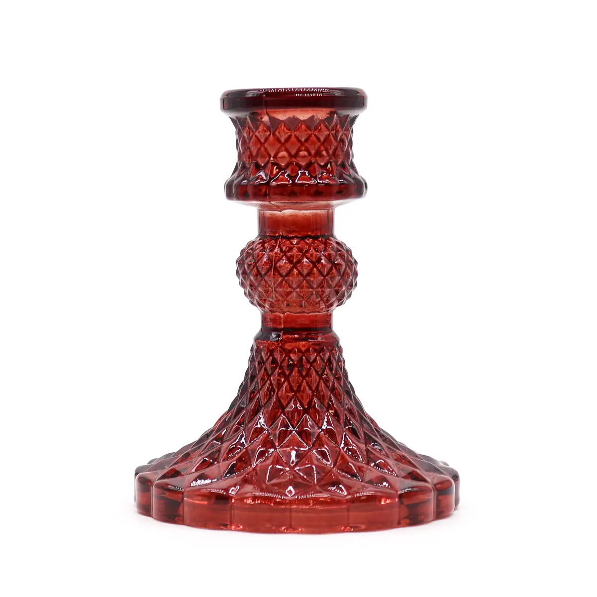 Röd vintage ljusstake i glas med dekorativt mönster