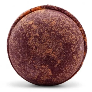 Rund badbomb i chokladbruna och apelsinfärgade toner