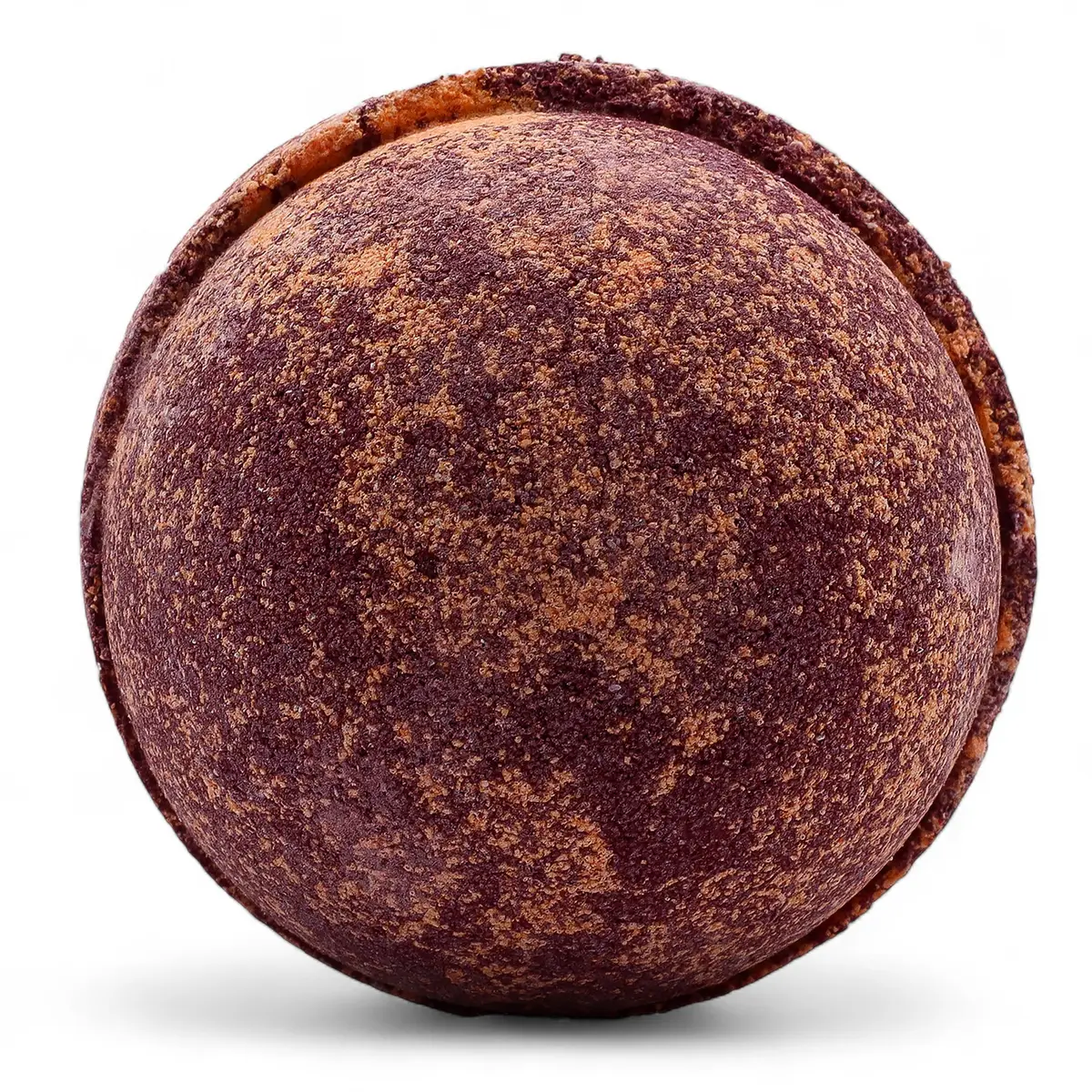 Rund badbomb i chokladbruna och apelsinfärgade toner