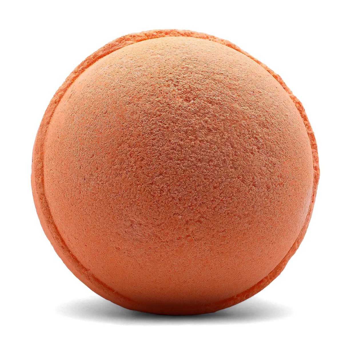 Rund mandarinorange badbomb med textur på ytan