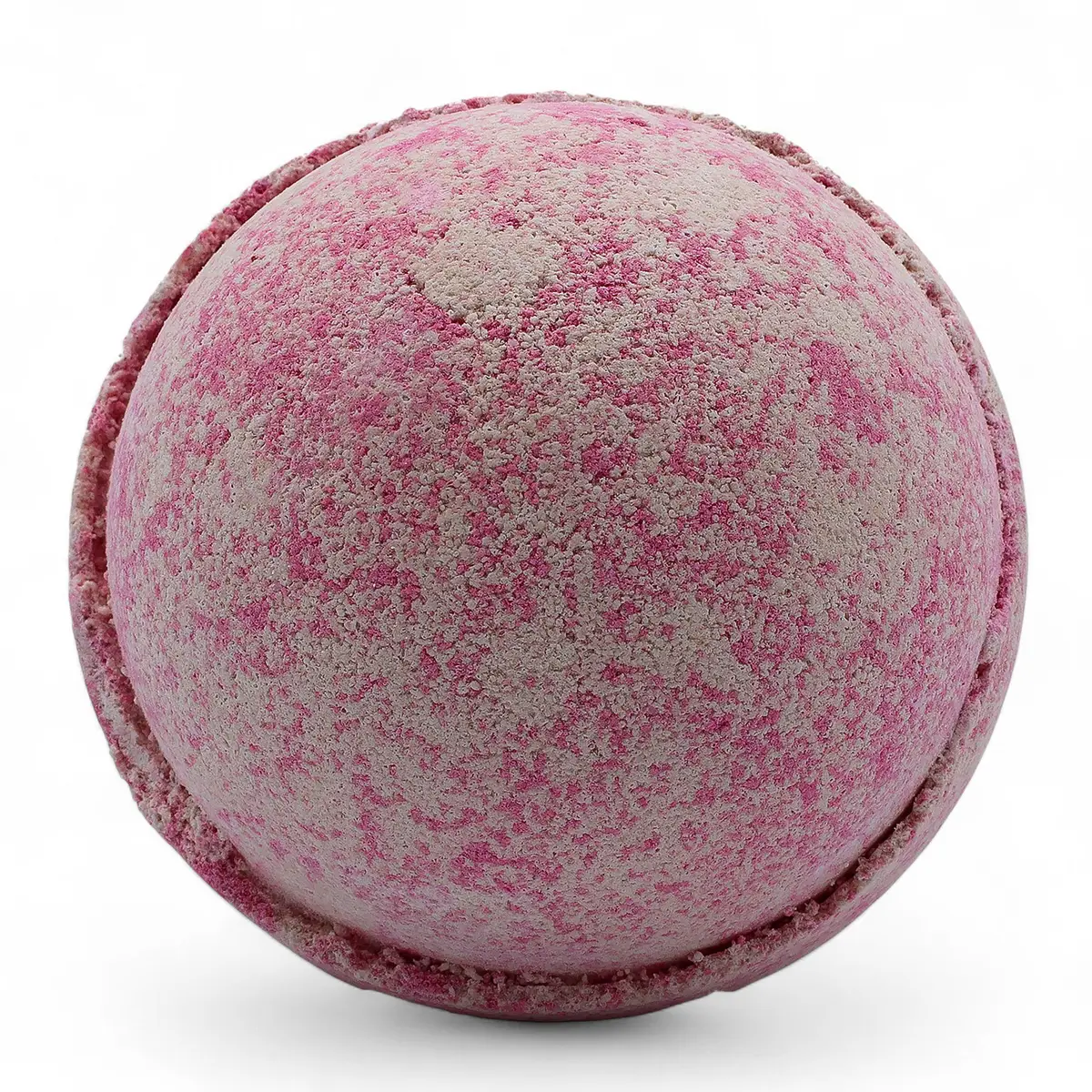 Rund rosa och beige badbomb med textur och festlig design