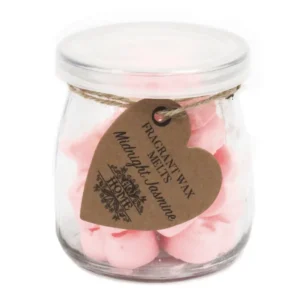 Burk med rosa hjärtformade sojavaxsmältor och etikett med texten Fragrant Wax Melts Midnight Jasmine