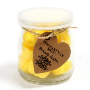 Glasburk med gula hjärtformade sojavaxsmältor och etikett Brandy Butter