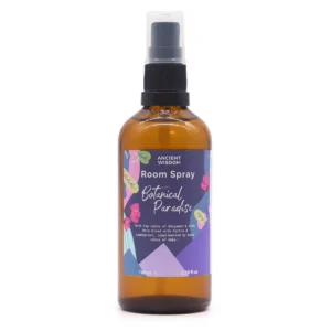 Brun glasflaska med spraypump och etikett för sommardoftspray Botanical Paradise